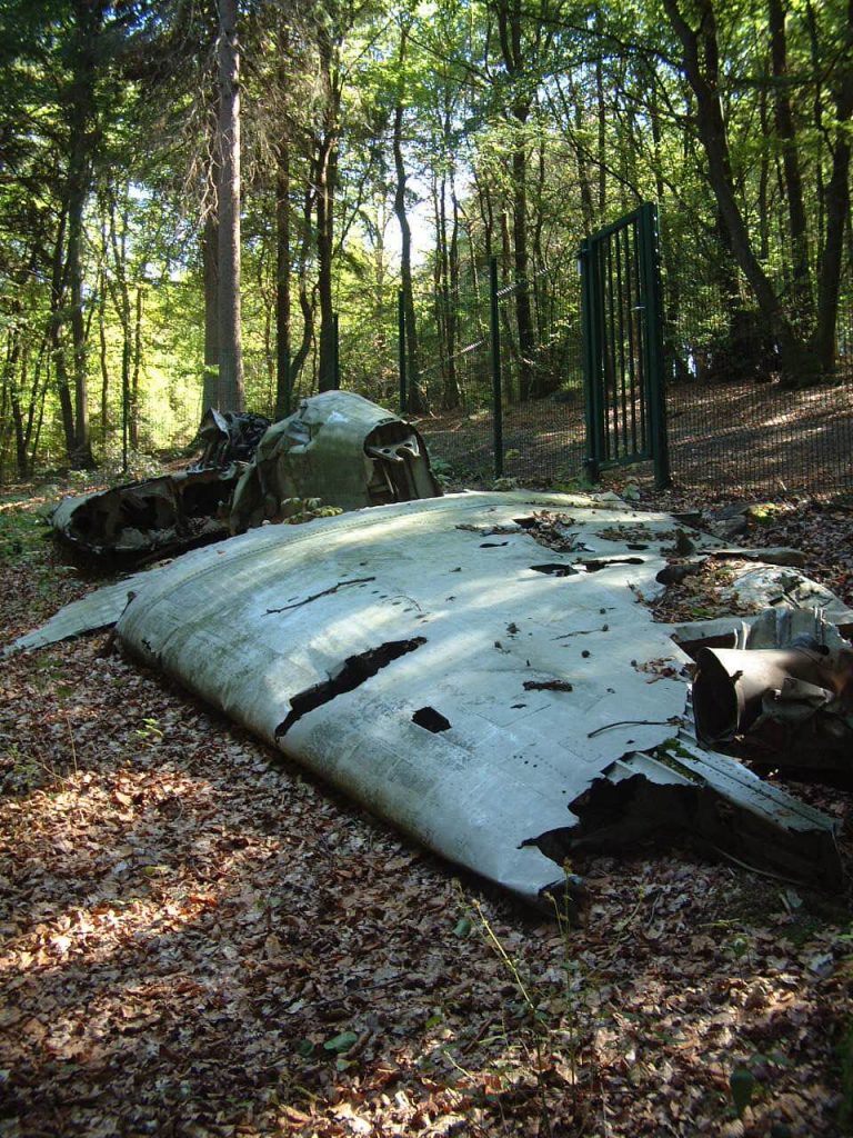 The skeleton of a plane pays tribute to the six Americans.